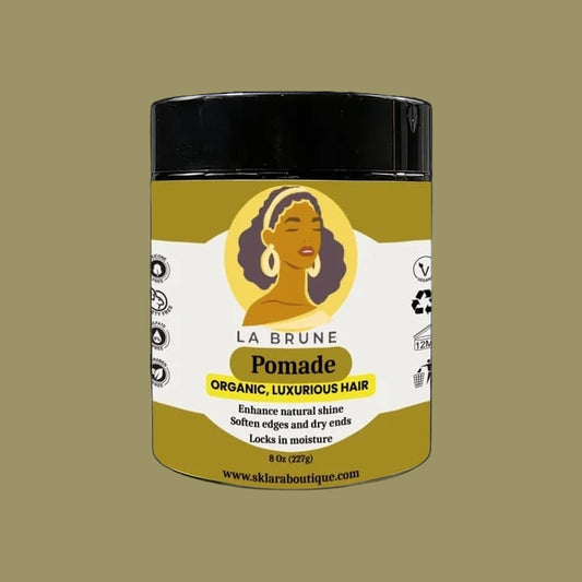 Jar of La Brune pomade with a black lid on a white background